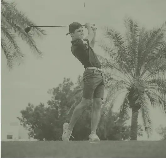 Lando playing golf
